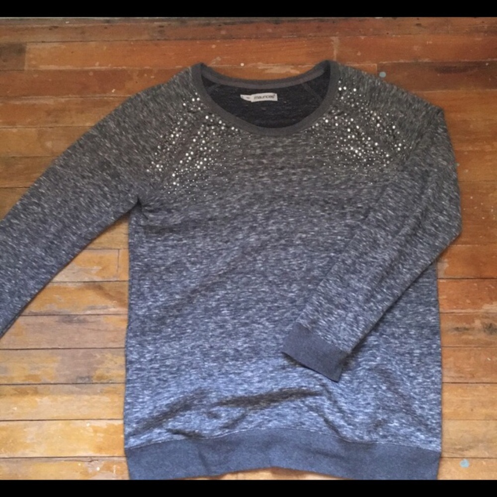 Maurice’s sweater with jewels on shoulders